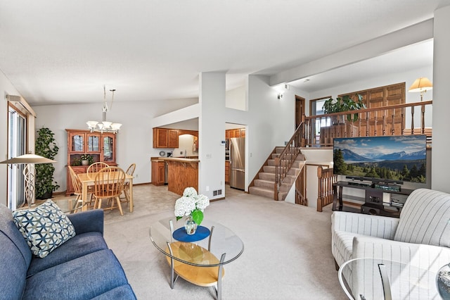 5711 Donegal Dr, Shoreview, MN 55126 - living room with vaulted ceiling, a chandelier, stairs, and light carpet