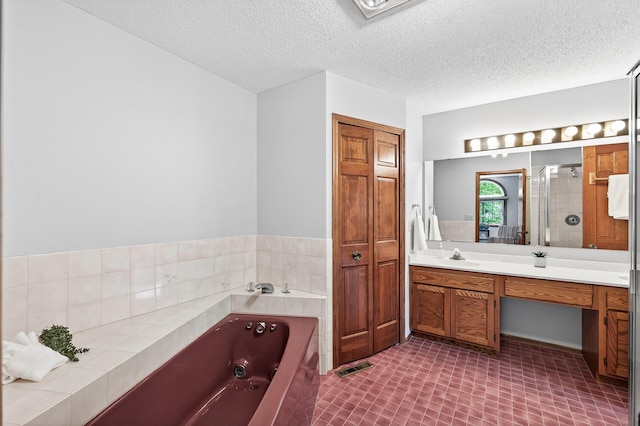 5711 Donegal Dr, Shoreview, MN 55126 - full bathroom featuring vanity, a bath, a shower stall, and a textured ceiling