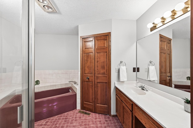 5711 Donegal Dr, Shoreview, MN 55126 - full bath with vanity, a bath, a textured ceiling, and a stall shower