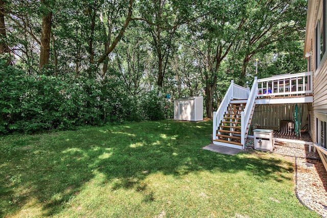 5711 Donegal Dr, Shoreview, MN 55126 - view of green lawn with stairway, a shed, and a wooden deck