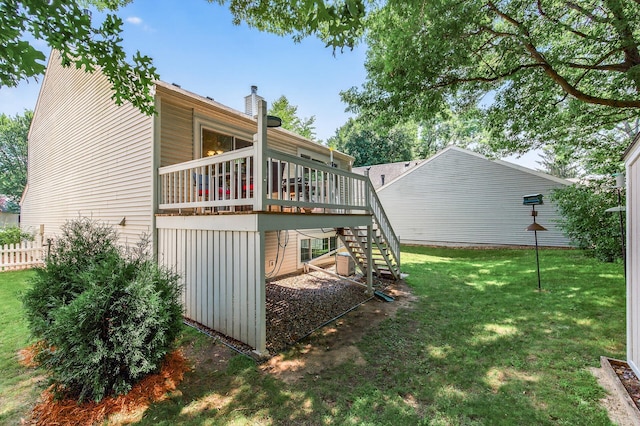 5711 Donegal Dr, Shoreview, MN 55126 - rear view of house with stairs, a wooden deck, and a chimney