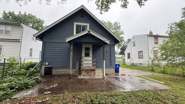 707 11th Ave SE, Rochester, MN 55904 - back of property featuring central air condition unit and a patio