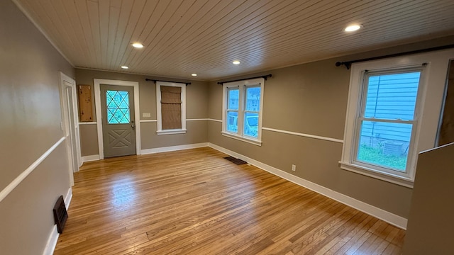 707 11th Ave SE, Rochester, MN 55904 - empty room featuring wood ceiling, light wood-type flooring, baseboards, healthy amount of natural light, and recessed lighting