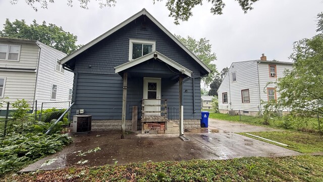 707 11th Ave SE, Rochester, MN 55904 - back of house featuring central AC and a patio area