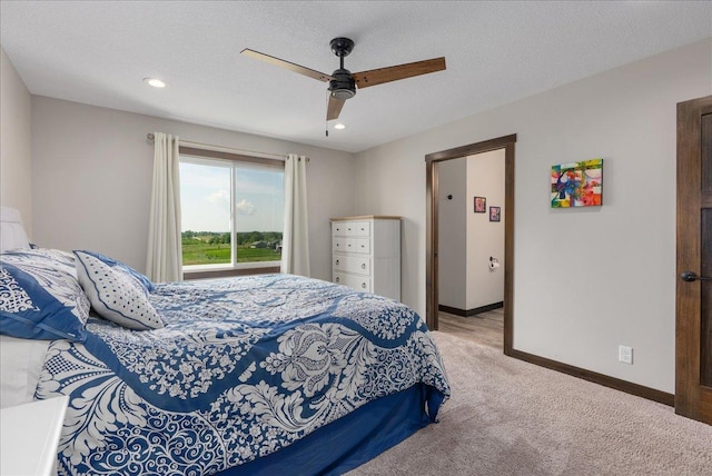 1609 75th Ave, Hammond, WI 54015 - bedroom with light colored carpet, a ceiling fan, and recessed lighting