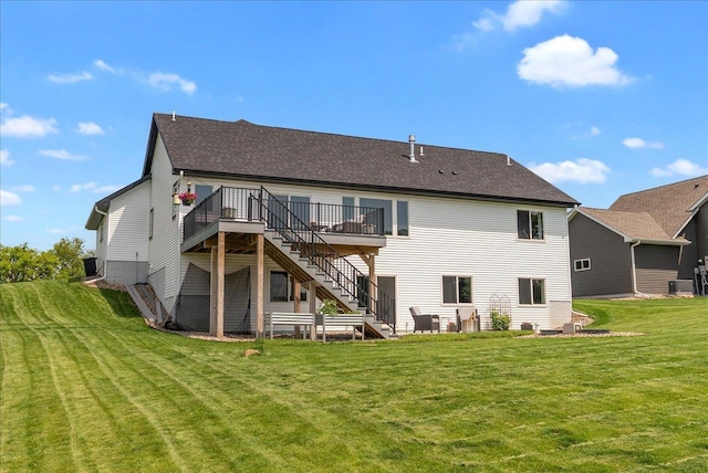 1609 75th Ave, Hammond, WI 54015 - rear view of house featuring stairway, a deck, a yard, and roof with shingles