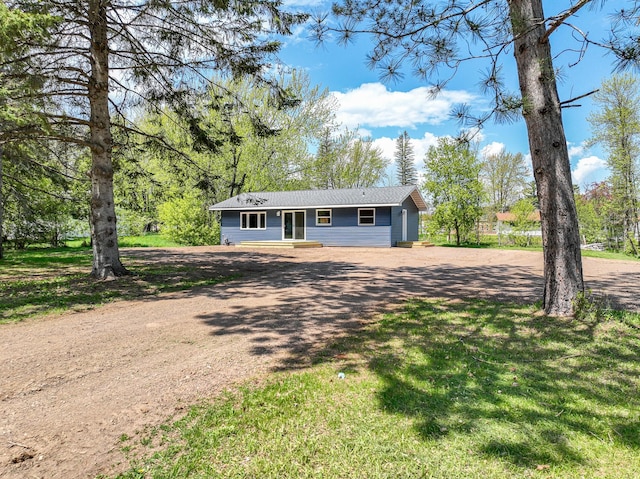 809 Crestwood Dr, Wrenshall, MN 55797 - ranch-style home with dirt driveway and a front yard