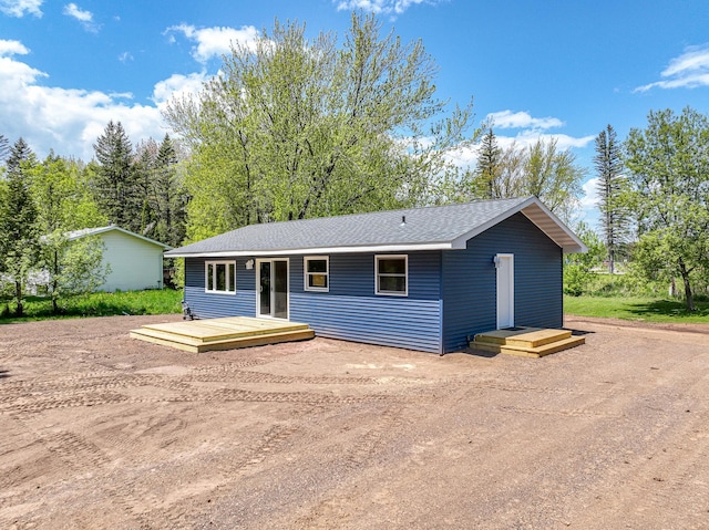809 Crestwood Dr, Wrenshall, MN 55797 - ranch-style home featuring a deck and roof with shingles