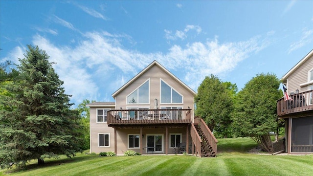 4132 Omaha Ln NW, Alexandria, MN 56308 - back of property featuring a deck, a yard, and stairs