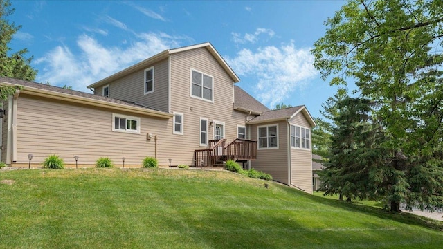 4132 Omaha Ln NW, Alexandria, MN 56308 - rear view of house with a yard, a deck, and stairs