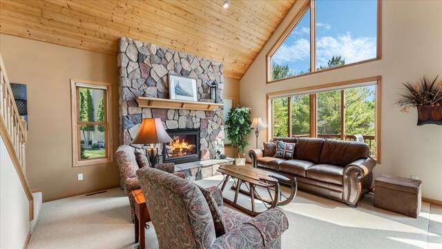 4132 Omaha Ln NW, Alexandria, MN 56308 - carpeted living room featuring wooden ceiling, high vaulted ceiling, a fireplace, and stairway