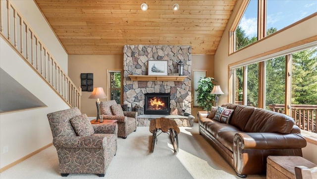 4132 Omaha Ln NW, Alexandria, MN 56308 - living room featuring wood ceiling, carpet, a stone fireplace, stairway, and high vaulted ceiling