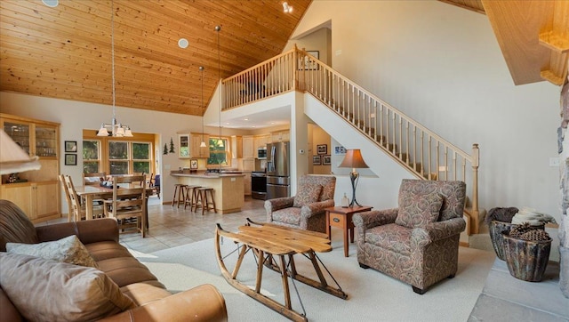4132 Omaha Ln NW, Alexandria, MN 56308 - living room with high vaulted ceiling, wooden ceiling, a chandelier, and light tile patterned floors