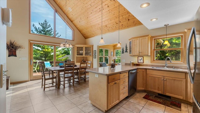 4132 Omaha Ln NW, Alexandria, MN 56308 - kitchen featuring a peninsula, appliances with stainless steel finishes, high vaulted ceiling, light tile patterned floors, and hanging light fixtures