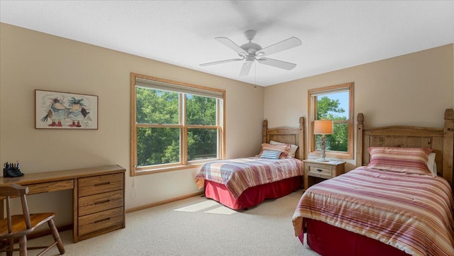 4132 Omaha Ln NW, Alexandria, MN 56308 - bedroom with light colored carpet, an office area, and ceiling fan