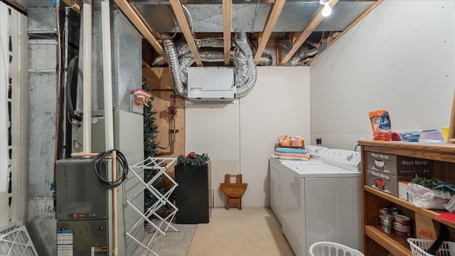 4132 Omaha Ln NW, Alexandria, MN 56308 - laundry area featuring washing machine and dryer and light colored carpet