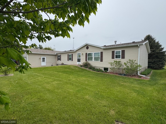 18755 Cassie Ln, Pokegama Twp, MN 55063 - back of house with a lawn