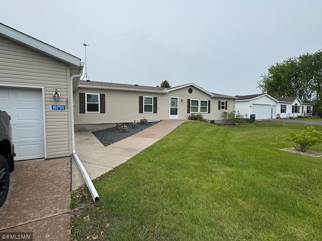 18755 Cassie Ln, Pokegama Twp, MN 55063 - back of house with a garage and a yard