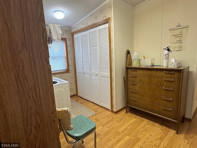 18755 Cassie Ln, Pokegama Twp, MN 55063 - corridor featuring ornamental molding, light wood-type flooring, a textured ceiling, washer / clothes dryer, and wallpapered walls