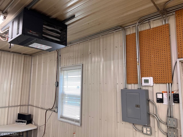 305 7th Ave E, Alexandria, MN 56308 - utility room with electric panel and a heating unit