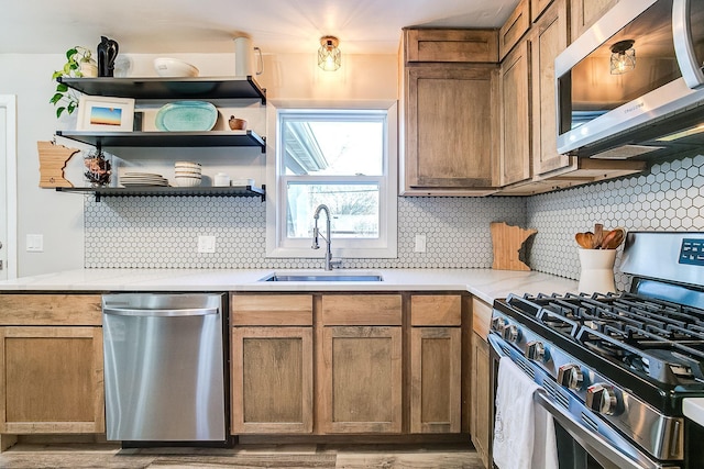 321 15th Ave N, Hopkins, MN 55343 - kitchen with appliances with stainless steel finishes, light countertops, decorative backsplash, wood finished floors, and open shelves