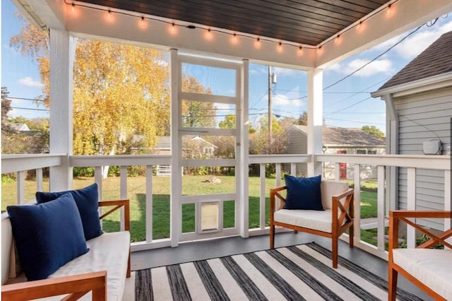 321 15th Ave N, Hopkins, MN 55343 - sunroom / solarium with rail lighting and healthy amount of natural light