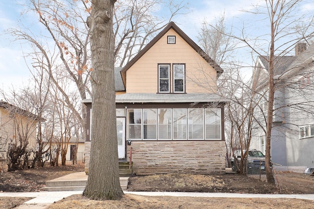 420 Lafond Ave, Saint Paul, MN 55103 - view of front of home with stone siding, entry steps, and a shingled roof