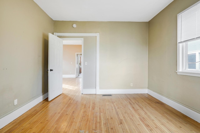 420 Lafond Ave, Saint Paul, MN 55103 - empty room featuring light wood-style flooring, baseboards, and a smoke detector