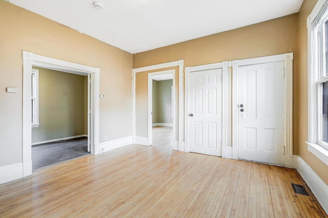 420 Lafond Ave, Saint Paul, MN 55103 - unfurnished bedroom with light wood-style flooring and baseboards