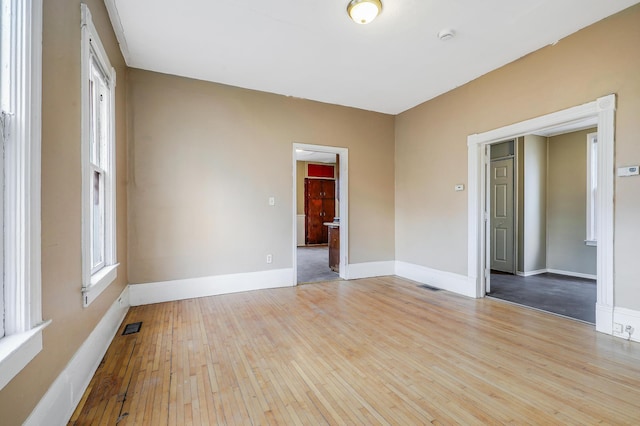 420 Lafond Ave, Saint Paul, MN 55103 - unfurnished room featuring light wood-style flooring, baseboards, and a smoke detector
