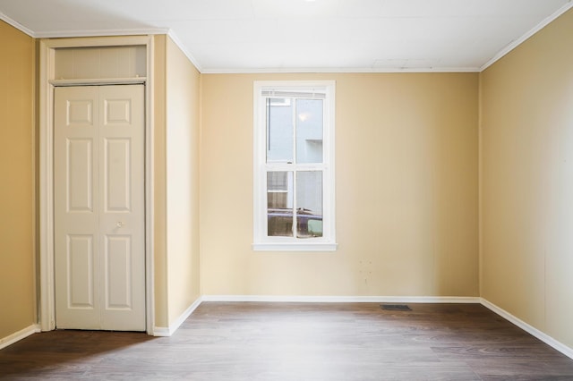 420 Lafond Ave, Saint Paul, MN 55103 - unfurnished bedroom featuring wood finished floors, baseboards, and ornamental molding
