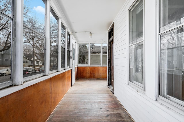 420 Lafond Ave, Saint Paul, MN 55103 - unfurnished sunroom with wood walls and hardwood / wood-style floors
