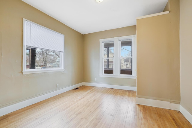 420 Lafond Ave, Saint Paul, MN 55103 - empty room featuring hardwood / wood-style floors and baseboards