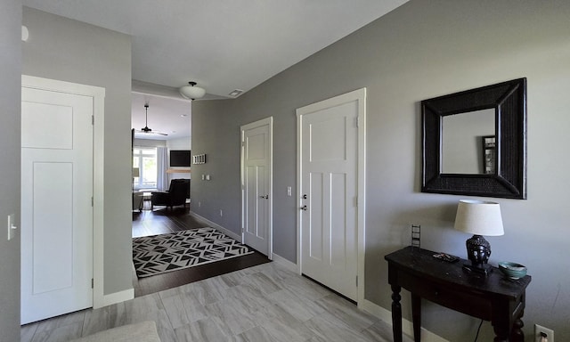1300 Event Center Dr NE # 23, Bemidji, MN 56601 - entrance foyer featuring baseboards and a ceiling fan