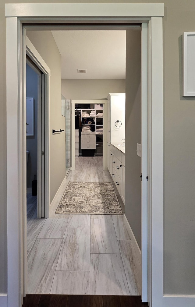 1300 Event Center Dr NE # 23, Bemidji, MN 56601 - corridor with light marble finish flooring and baseboards