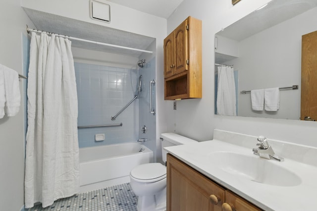 1425 28th St Unit 201, Minneapolis, MN 55408 - full bathroom with vanity, shower / bath combo with shower curtain, toilet, and tile patterned flooring