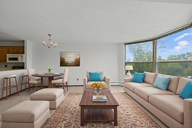 1425 28th St Unit 201, Minneapolis, MN 55408 - living area featuring a chandelier, a baseboard heating unit, and light wood-type flooring