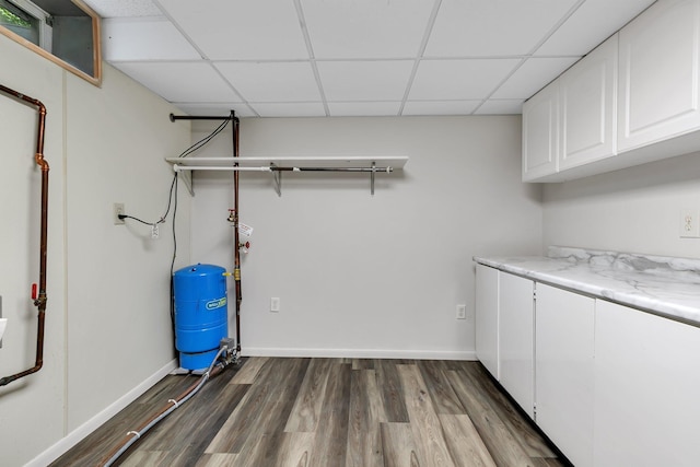829 Cummings Ln, Saint Cloud, MN 56301 - washroom featuring dark wood finished floors and baseboards