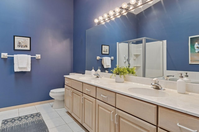 8910 Hilloway Rd, Eden Prairie, MN 55347 - bathroom featuring tile patterned floors, double vanity, and a shower stall