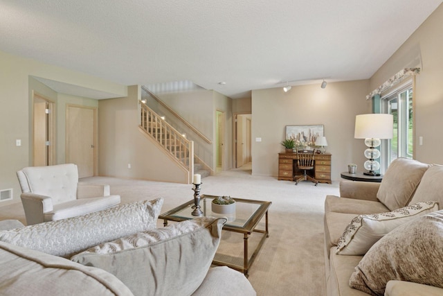 8910 Hilloway Rd, Eden Prairie, MN 55347 - living area featuring carpet flooring and stairway