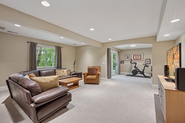 6253 Niagara Ct N, Maple Grove, MN 55311 - living room with light carpet, recessed lighting, baseboards, and arched walkways