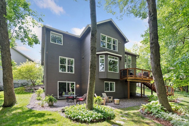 6253 Niagara Ct N, Maple Grove, MN 55311 - rear view of property with a deck, stairway, a patio, and a lawn