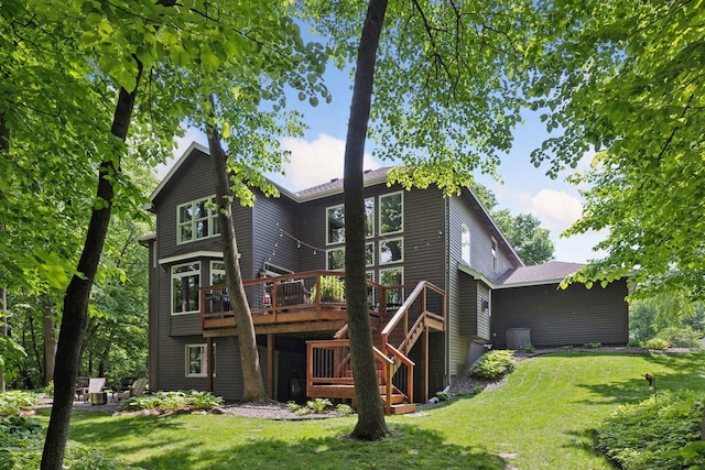 6253 Niagara Ct N, Maple Grove, MN 55311 - back of property featuring a wooden deck, a lawn, and stairway