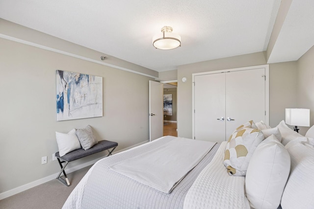 52 Groveland Ter Unit A402, Minneapolis, MN 55403 - carpeted bedroom featuring a closet and baseboards
