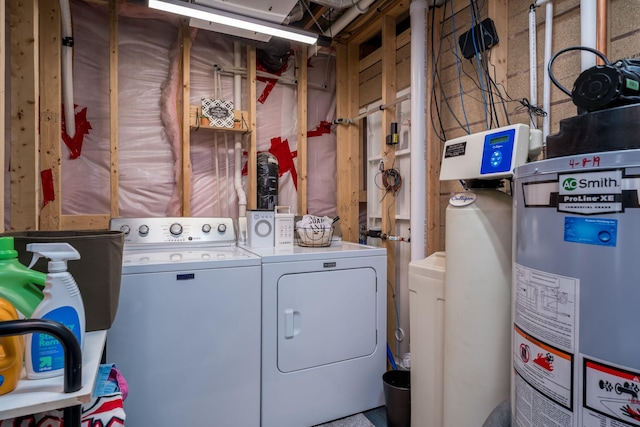 641 Beverly St, Wanamingo, MN 55983 - laundry room featuring washer and dryer and gas water heater