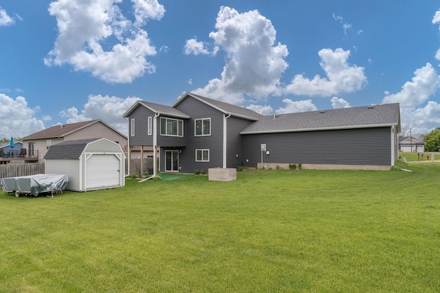 641 Beverly St, Wanamingo, MN 55983 - back of house featuring a yard
