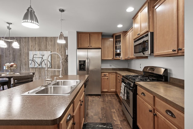 3474 White Pine Way, Stillwater, MN 55082 - kitchen with stainless steel appliances, dark countertops, a sink, an island with sink, and dark wood-style floors