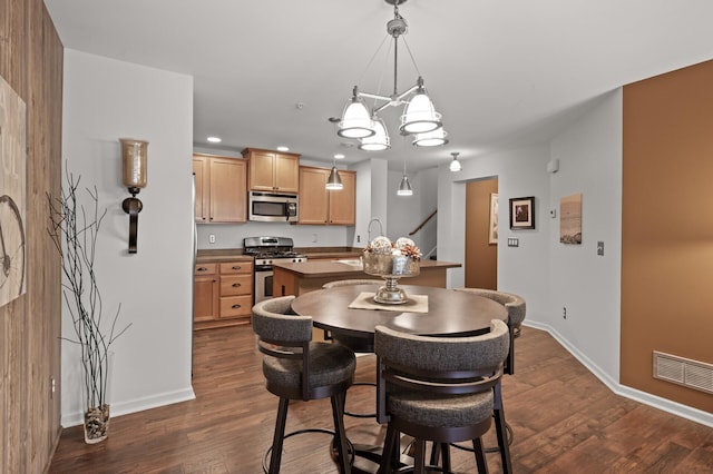 3474 White Pine Way, Stillwater, MN 55082 - dining area featuring baseboards, dark wood-style floors, recessed lighting, and a chandelier