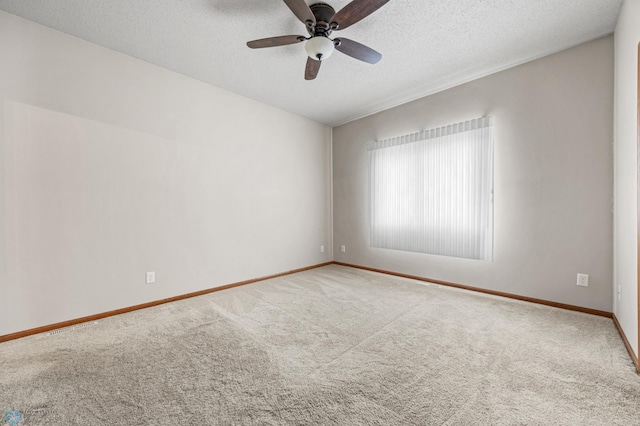 4388 52nd St S, Fargo, ND 58104 - carpeted spare room featuring a textured ceiling and a ceiling fan