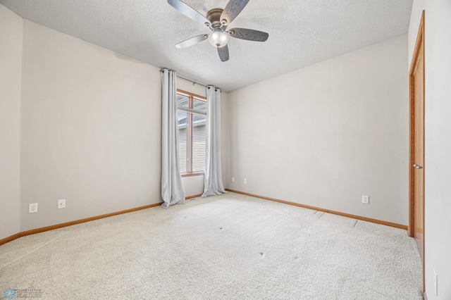 4388 52nd St S, Fargo, ND 58104 - carpeted spare room featuring a ceiling fan and a textured ceiling